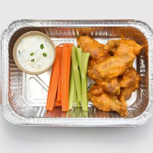 Golden, crispy chicken wings served with ranch sauce, celery, and carrot sticks.